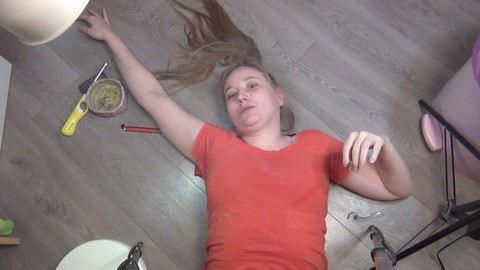 Blonde newbie indulges in her smoking fetish on the floor