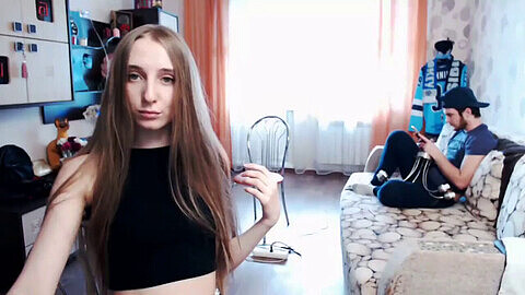 Beautiful Bulgarian girl with long hair teasing in hot strip show