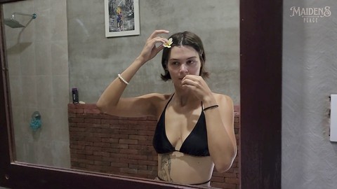 In the bathroom, shes, tub